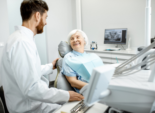 older woman consulting with dentist